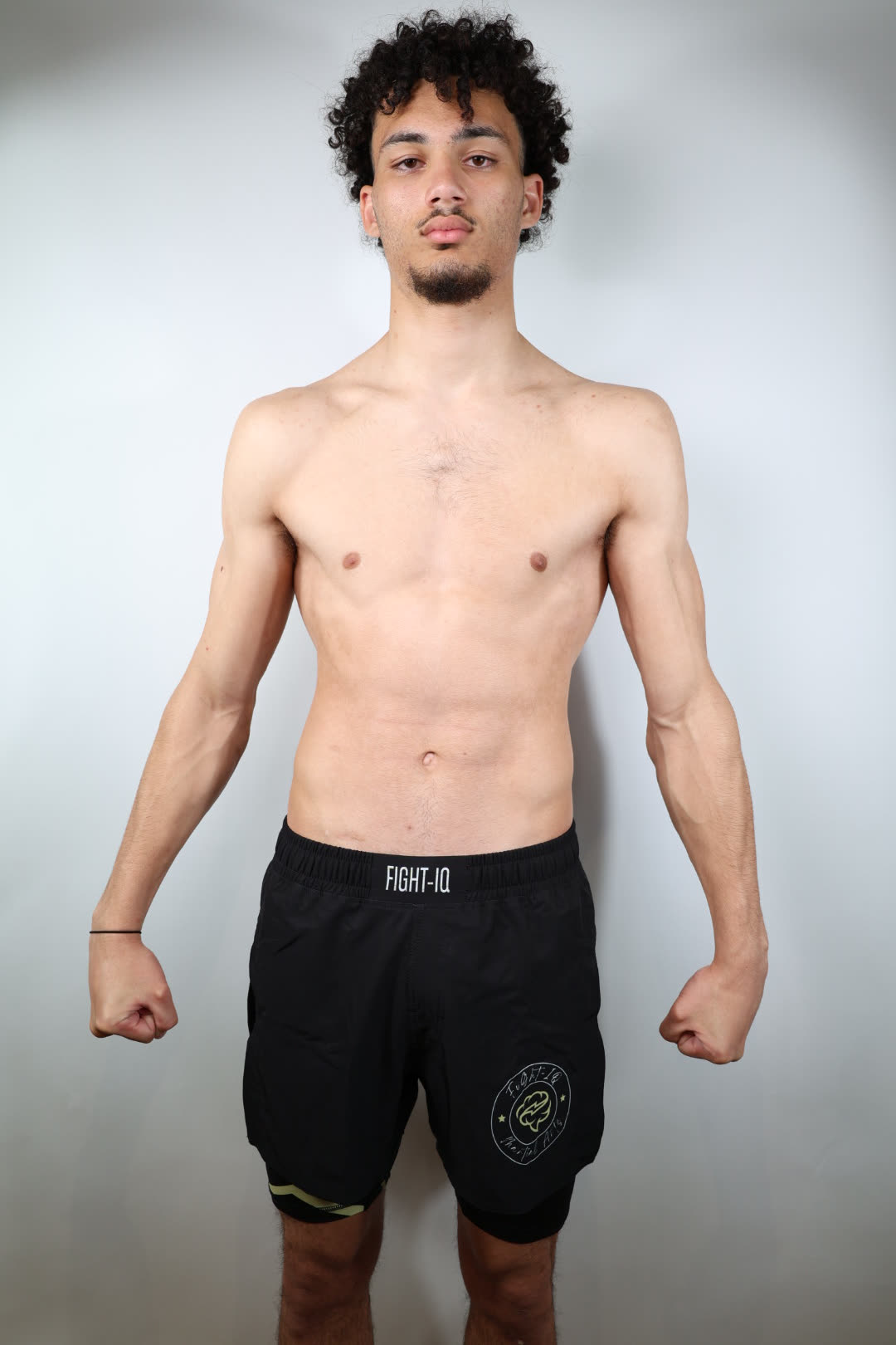 RAGE GUARD black and gold rashguard, front view